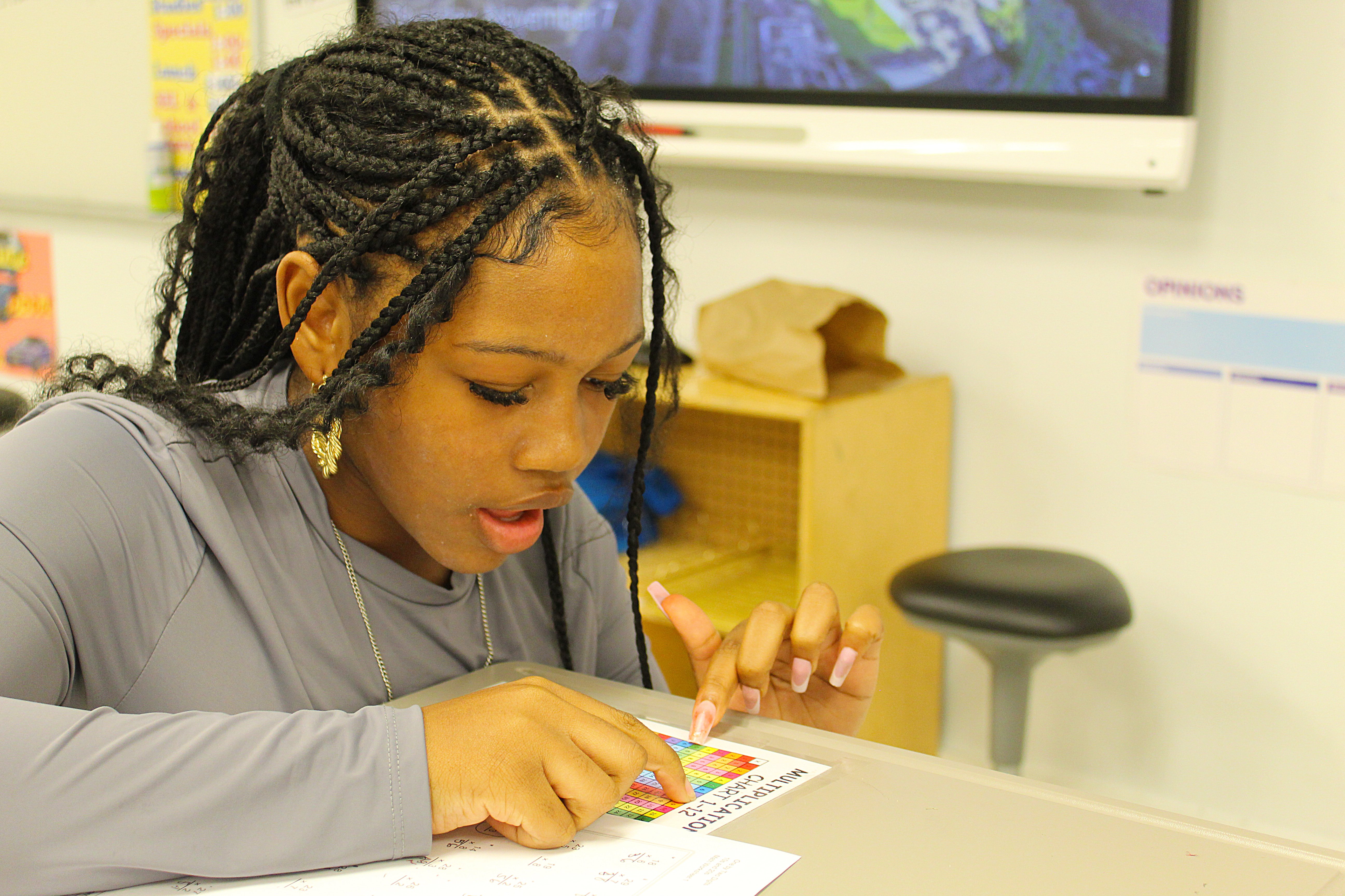 Female student doing classwork 4
